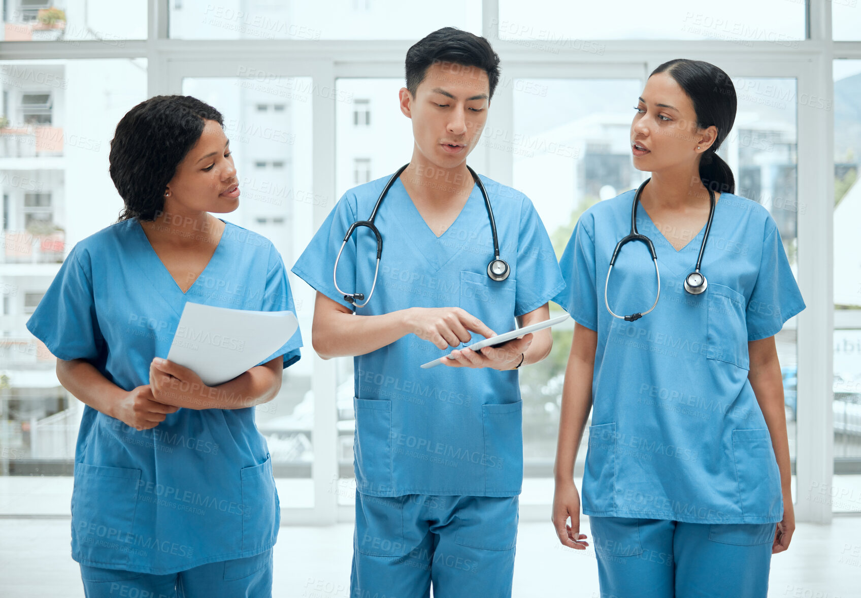 Buy stock photo Teamwork, discussion or surgeons with tablet planning strategy in hospital in collaboration meeting. Leadership, doctors or nurses talking or speaking of healthcare research, reports or digital news