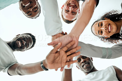 Buy stock photo Sky, hands stack and portrait with fitness for teamwork, support or running motivation in nature. Low angle, diversity and group of people with huddle for synergy, community or race in morning
