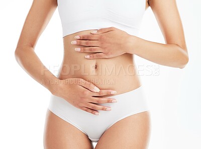 Buy stock photo Body, underwear and person with digestion in studio for anatomy, natural diet or healthy lifestyle on white background. Stomach, slim and hands of model with frame for detox, lose weight or nutrition