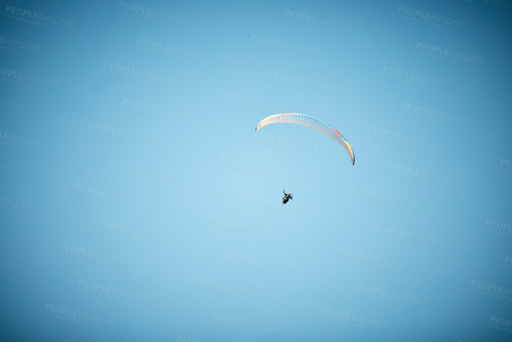 Buy stock photo Space, parachute or person paragliding in blue sky for holiday, flight freedom or courage with extreme sport. Mockup, fearless paraglider in outdoor adventure for health, vacation or travel in air