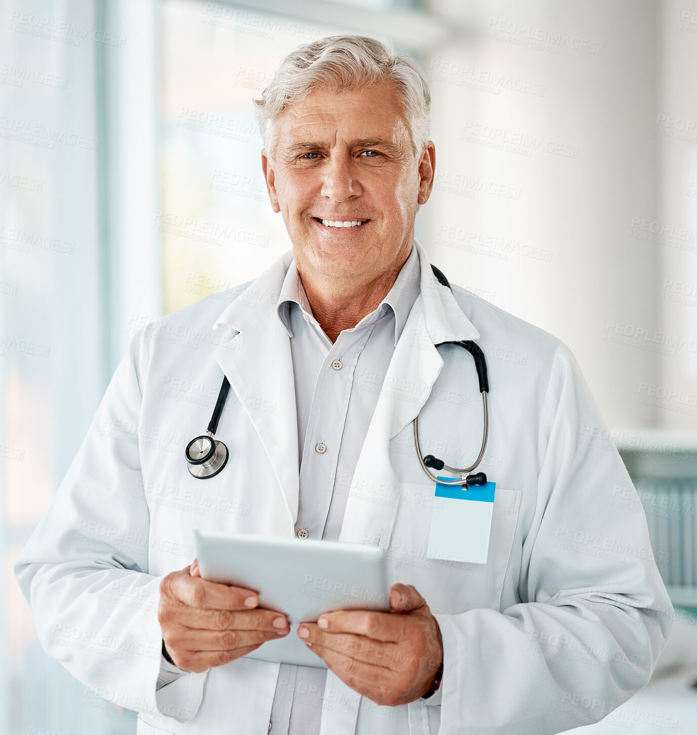 Buy stock photo Healthcare, portrait and tablet with mature doctor in hospital for appointment or checkup. Cardiology, medical and smile with confident medicine professional in clinic for consulting or treatment