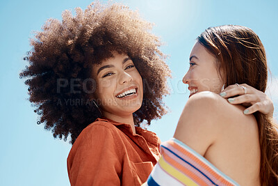 Buy stock photo Happy couple, lesbian and hug in outdoor portrait, bonding and blue sky for security. People, lgbtq and embrace for romance on holiday or together for date, support and trust or affection on vacation