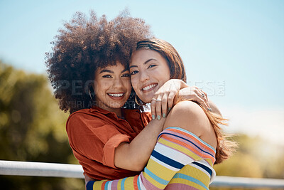 Buy stock photo Couple, lesbian and hug in outdoor portrait, bonding and together for security in nature. Happy people, lgbtq and embrace for romance on balcony, support and trust in connection or love for partner