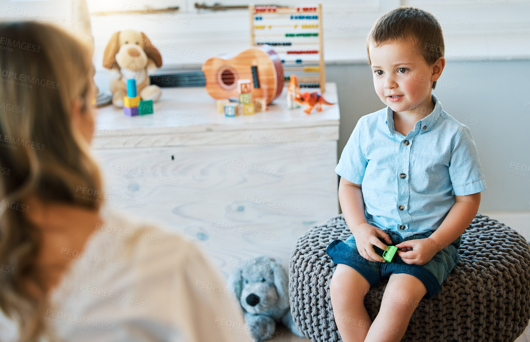 Buy stock photo Child, psychology and woman talking for therapy consultation, development evaluation and health progress review. Boy, psychologist and checkup for autism counselling, learning support and assessment