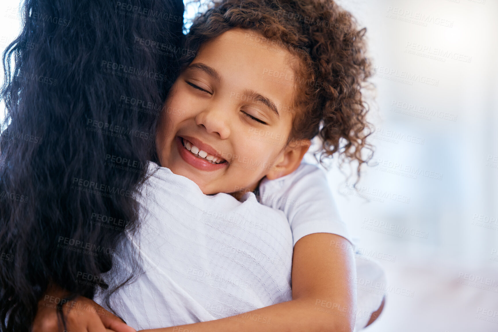 Buy stock photo Smile, kid and hug mom in home for support, love and trust for healthy relationship together. Eyes closed, bonding and girl embrace mother for care, connection and celebrate winning child custody