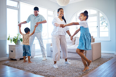 Buy stock photo Happy family, dancing and playing with energetic children for bonding, weekend or holiday at home. Mother, father and kids enjoying music or fun activity with parents in living room together at house