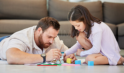 Buy stock photo Father, girl and toys for playing together in home, childcare and floor for games in living room. Daddy, daughter and blocks for education in lounge, support and care for kids or love and learning