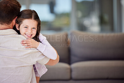 Buy stock photo Hug, father and happy girl portrait in family home with bonding, love and care in living room. Smile, embrace and young kid with parent support and fun together with dad by sofa with mockup space