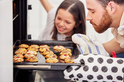 Buy stock photo Father, child and baking cookies in oven for bonding time, teaching recipe and development in family home kitchen. Dad, young girl and biscuits for dessert food with learning skill, growth and trust