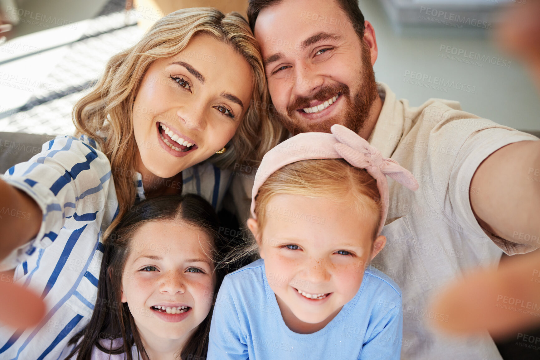 Buy stock photo Selfie, children and parents with smile, home and profile picture of happy family, love and bonding.  House, man and woman with memory to share with girls, joy and photography of kids with mom or dad