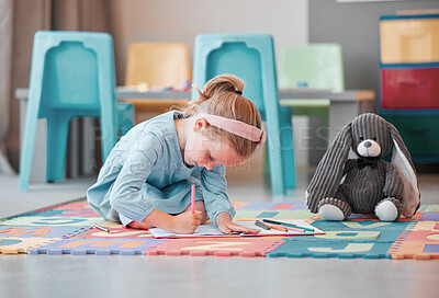 Buy stock photo Notebook, teddy bear and young child writing in psychology office for social development. Growth, plush toy and girl kid patient drawing on floor at healthcare clinic for cognitive behavioral therapy