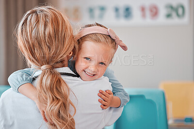 Buy stock photo Hug, therapy and portrait of child in clinic and doctor for support and kid with autism. Mental health, wellness and girl in office for care, consulting and happy for assessment, results and woman  