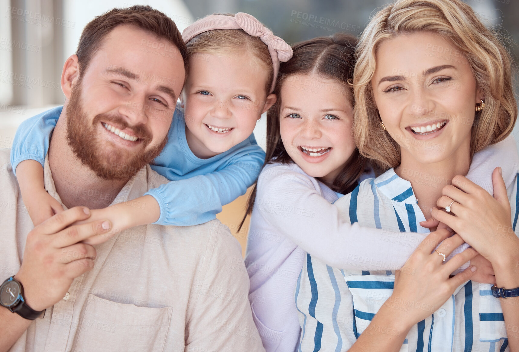 Buy stock photo Portrait, hug and family with love, smile and relax with happiness, together and children. Face, parents and mother with father, embrace and house with girls, cheerful and joyful kids in lounge