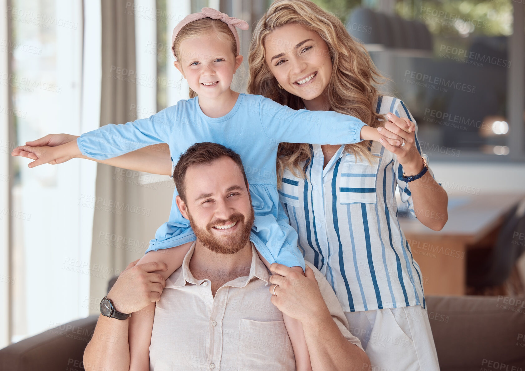 Buy stock photo Parents, girl and portrait on shoulders on sofa with plane, care and games with holding hands with smile. Father, mother and daughter with love, connection and airplane with flight in family house