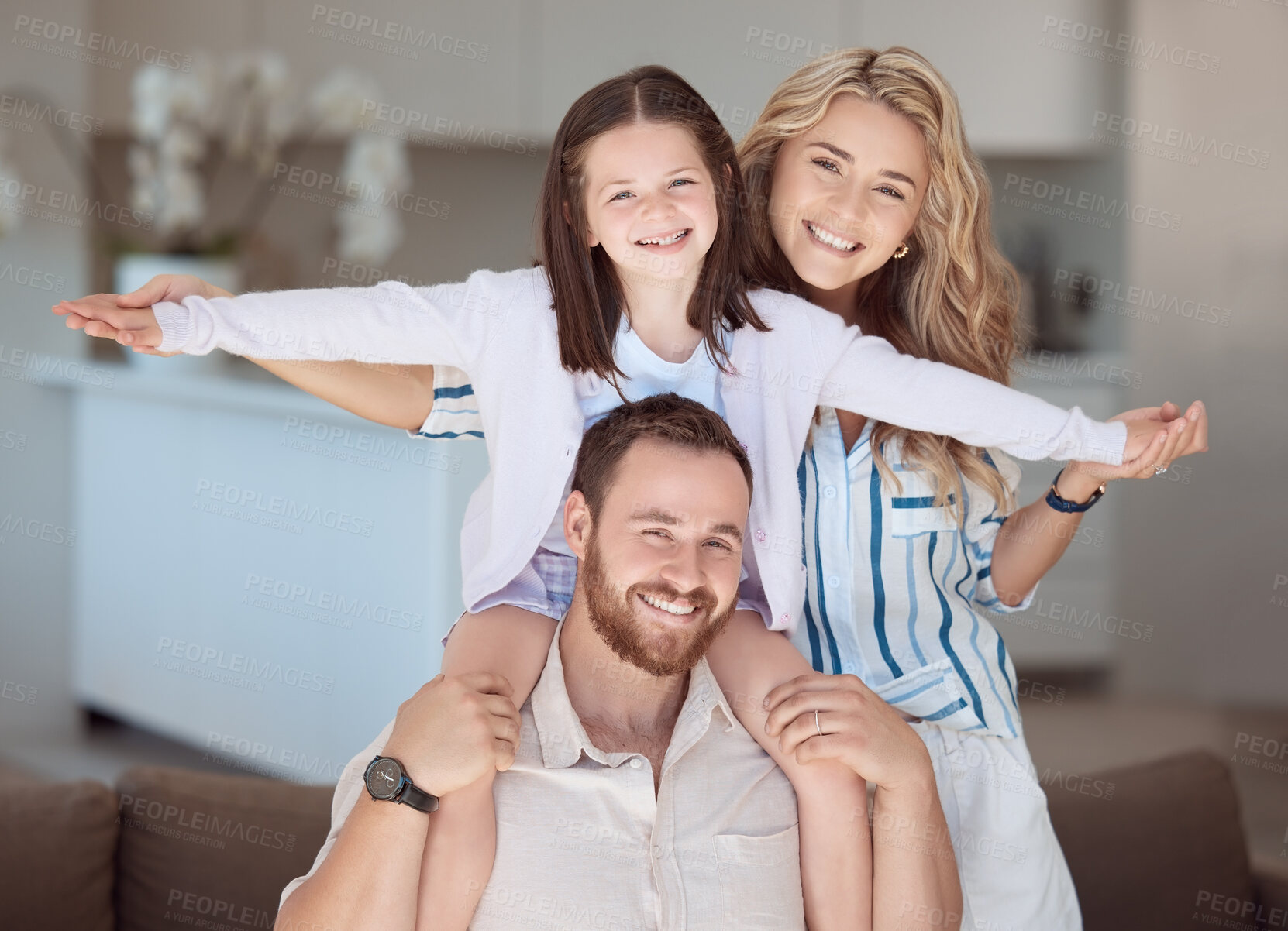 Buy stock photo Parents, girl and portrait on shoulders on couch with plane, care and games with holding hands with smile. Father, mother and daughter with love, connection and airplane with flight in family house