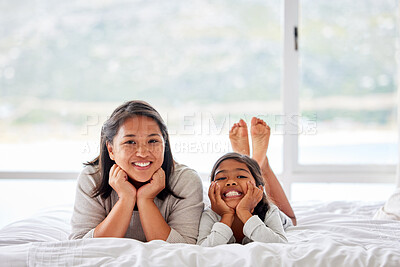 Buy stock photo Mother, girl and portrait in bed for relax, home and bedroom for bonding and weekend rest. Support, together and love from mom for child with smile, family and mum for motherhood and holiday break