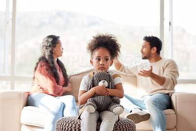 Buy stock photo Frustrated couple, fight and disagreement with child on sofa for living room dispute or conflict at home. Scared little girl with teddy bear and parents in argument, breakup or divorce at house