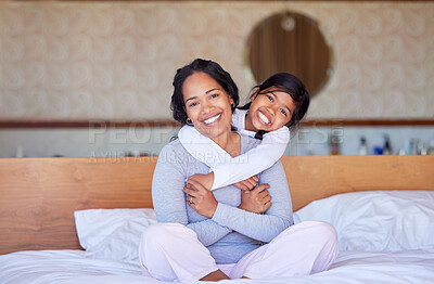 Buy stock photo Bedroom, Indonesian mother and child in portrait for bonding with family, smile or hug in house. Mom, daughter or happiness in home or embrace for wellness, learning and development or parenting