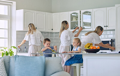 Buy stock photo Home, busy mom and routine with children for lunch, preparation and multitasking in morning. Kitchen counter, little girl and brother with mother, cooking and getting ready for school with breakfast