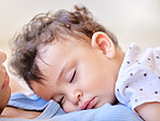 Little baby sleeping on mother's chest. Small girl asleep on her mom. Face of baby resting. Mother holding her sleeping child. Affectionate mother bonding with sleeping kid. Cute baby napping