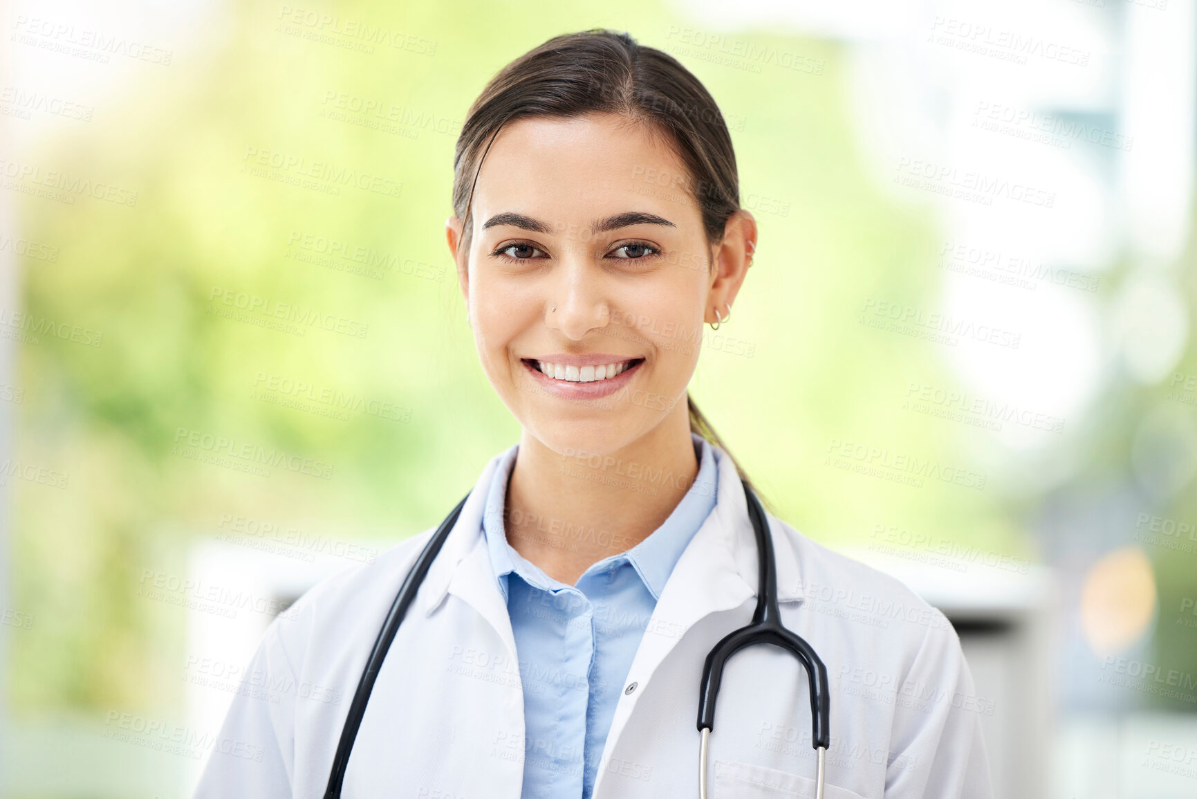 Buy stock photo Doctor, woman and happy in portrait in clinic for healthcare, medical treatment or confidence for career in cardiology. Medicine, professional or person with stethoscope for hospital support or trust