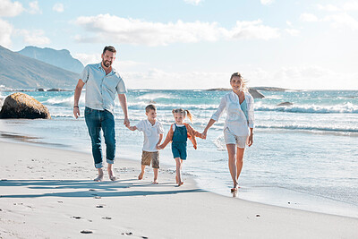 Buy stock photo Parents, children and holding hands for walk at beach with smile, portrait and connection on holiday. People, family and travel with care, love and bonding in nature for vacation by sea in Italy