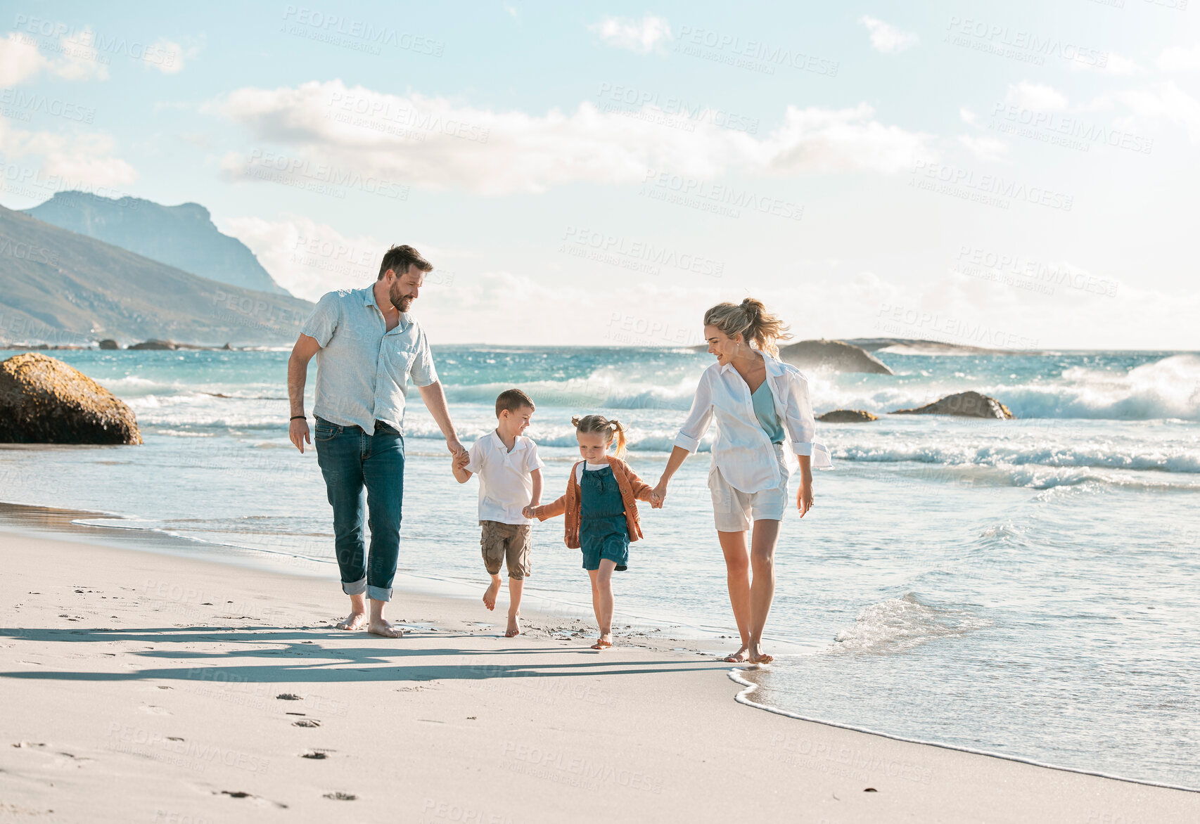 Buy stock photo Parents, children and holding hands for vacation at beach with smile, outdoor and connection on walk. People, family and kids with care, love and bonding in nature for holiday by ocean in Italy