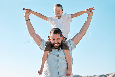 Buy stock photo Beach, portrait and father with child on shoulders for holiday, vacation and adventure outdoor. Family, travel and dad with boy by ocean for bonding, relationship and fun trip by sea to relax