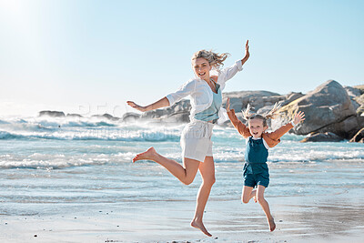 Buy stock photo Jump, beach and mother with girl for holiday, waves and outing to nature for bonding. Family, love and children with female person and school vacation for fun, summer and seaside trip on island