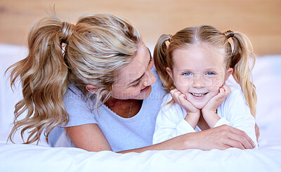 Buy stock photo Smile, parent and child in bed for portrait and relax, rest and bonding in bedroom of family home. Happy, hug and mother person with young girl for unity, support and love or cozy together on weekend