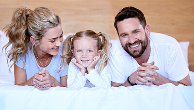 Buy stock photo Bed, happy and portrait of parents with child for relax, resting and comfortable in morning. Family, home and mother, father and girl in blanket for bonding, relationship and love on weekend