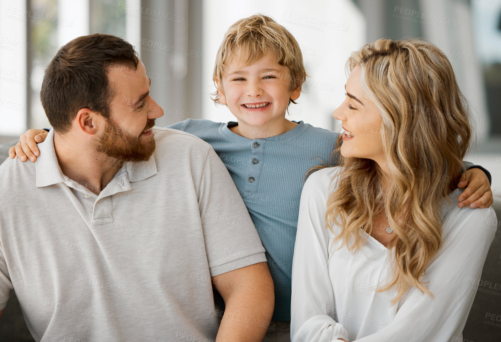 Buy stock photo Portrait, love and child with property, happy family or house to relax with security, safety and care. Smile, boy or proud parents on sofa with kid, support and trust for bonding together in home