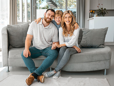 Buy stock photo Happy portrait, parents and son on couch for relationship, love and bonding hug in family home. Smile, mom and dad with young boy on sofa for security embrace, relax together and care in Australia