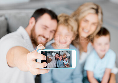 Buy stock photo Phone screen, selfie and family on sofa in home for relax, bonding and connection together. Happy, love and parents with cellphone for photography picture with children in living room at house.