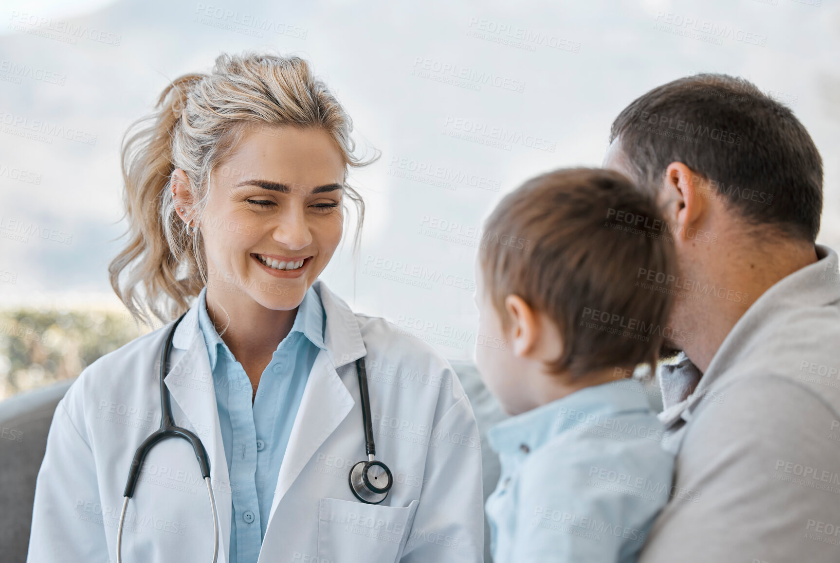 Buy stock photo Woman, doctor and father with kid for consultation or checkup with smile, support and care. Healthcare worker, parent and happy with boy for medicare help, immunization and pediatrics for wellness