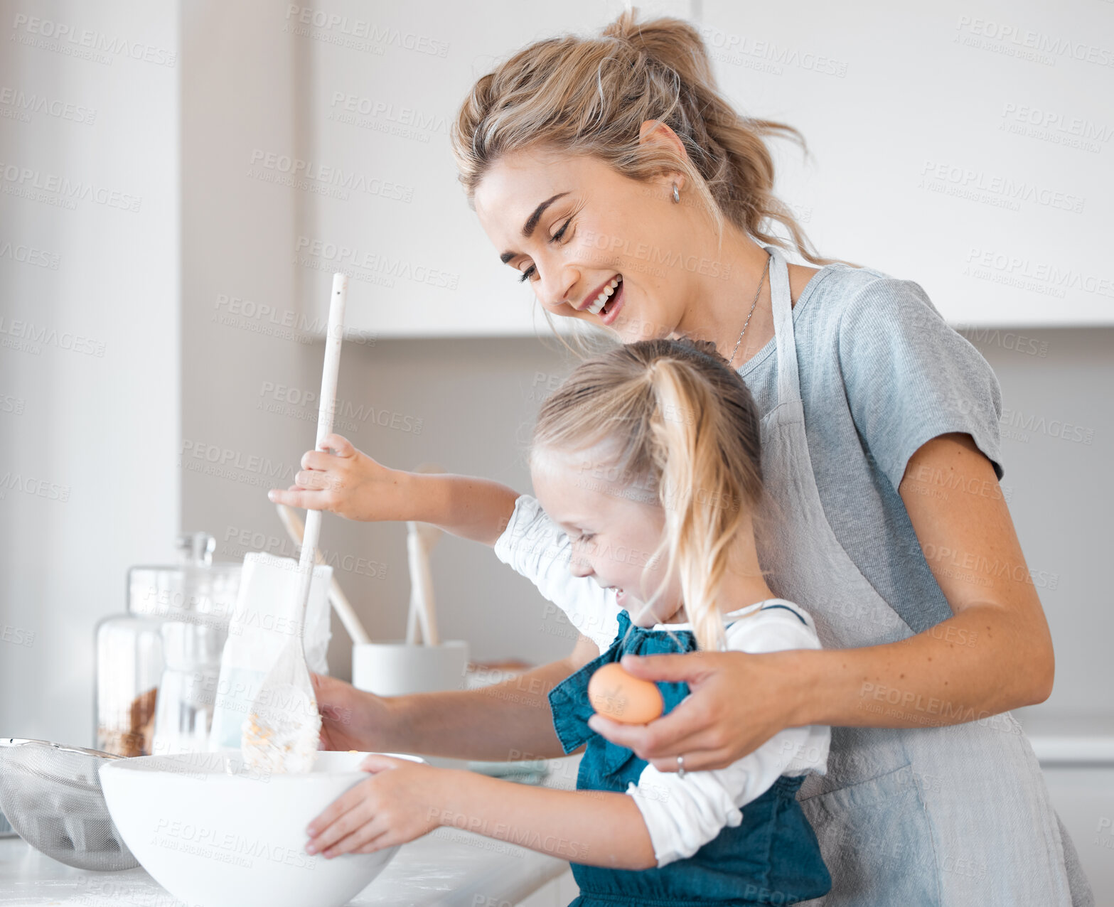 Buy stock photo Kitchen baking, woman and helping kid cooking, happy and preparing egg, flour or food ingredients. Mama, love and family fun or mother bonding with daughter, child development support and home