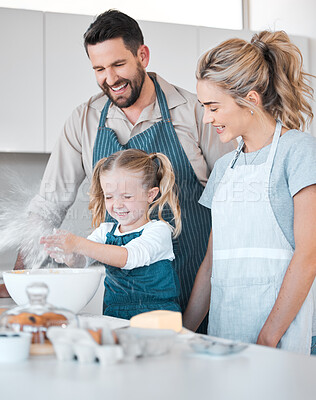 Buy stock photo Kitchen, baking and family with messy girl, cooking and happy with help for flour or food ingredients. Parents, love and home with mother, father and bonding for child development, support and care