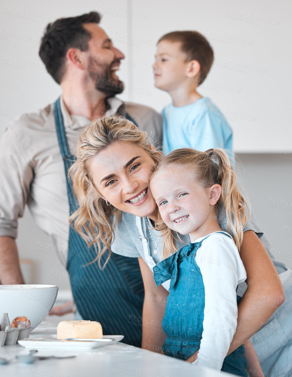 Buy stock photo Woman, girl and baking in house kitchen with smile, butter and bowl for cookie, bread and cake. Mother, child and cooking with love, family and hug in home for dessert, food and pastry in portrait