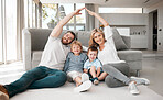 Smiling couple with little kids sitting and making symbolic roof of hands over children. Caucasian brothers protected by parents. Mother and father covering their sons with family care and insurance