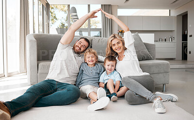 Buy stock photo Happy, portrait and family in home for security, insurance and support or relax for love on floor. Mom, dad or parents with kids or arms with smile, house and care or protection in living room