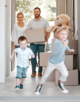 Buy stock photo Kids, running and parents with boxes in new home for relocation, support and happiness. Real estate, excited and children or people in house for wellness, moving and investment for future and family