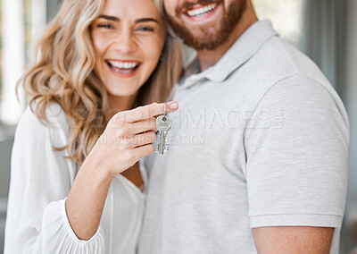 Buy stock photo Couple, smile and portrait with keys for real estate, moving and celebration in new house together. Man, woman and face in lounge with achievement for property investment, rental or mortgage loan