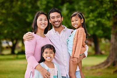 Buy stock photo Portrait, happy and family with love outdoor for bonding, care and embrace of travel adventure at park. Smile, Asian people and parents with kids for support and fun holiday together for childhood