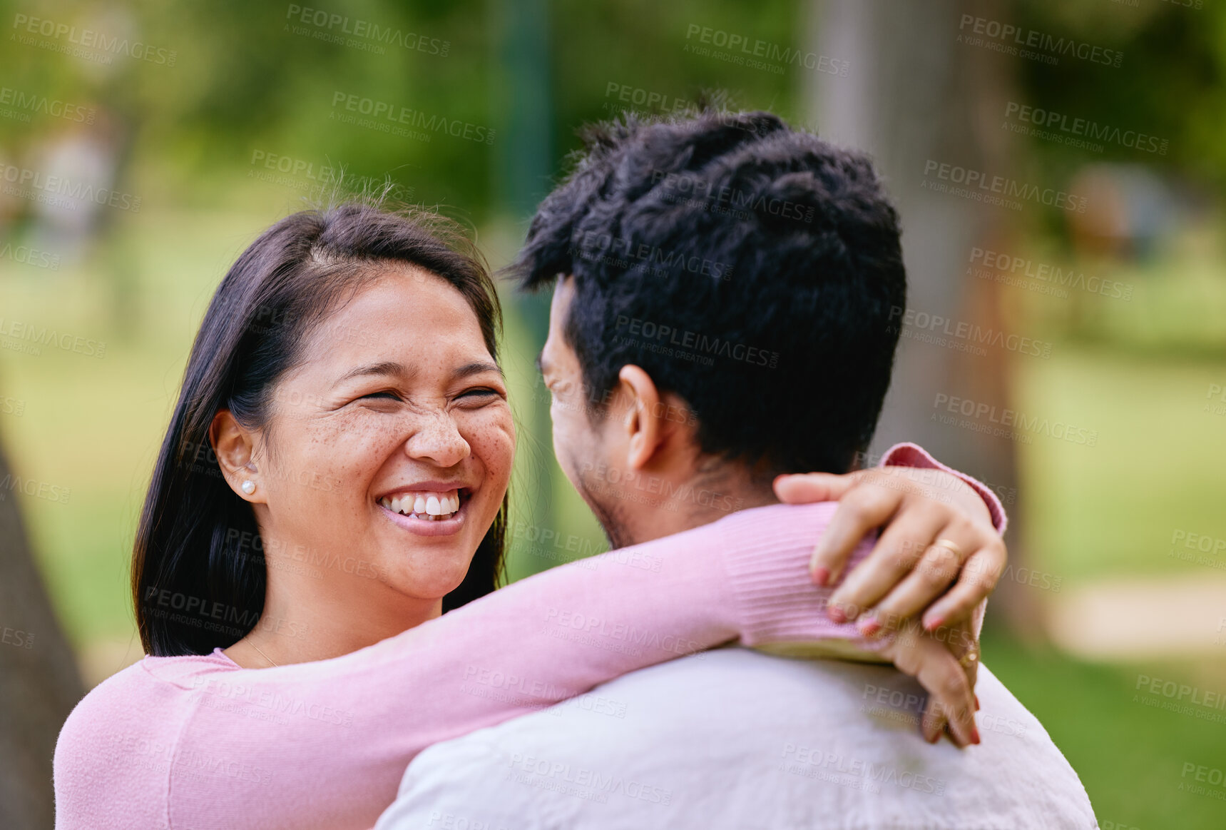 Buy stock photo Hug, love and couple in park, smile and bonding together with happiness, vacation and romantic. Relationship, outdoor and marriage with man, woman and care with weekend break, moment and embrace