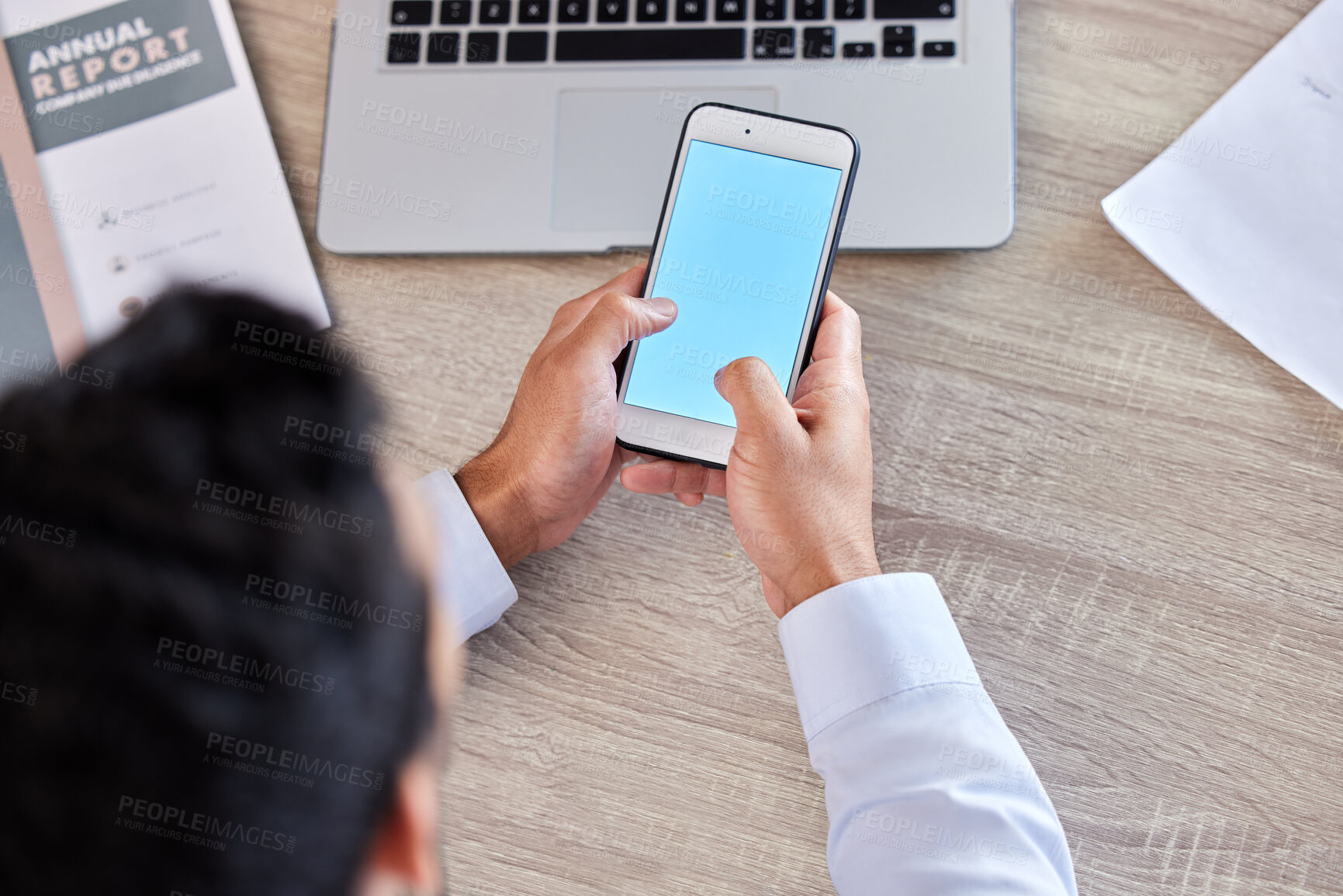 Buy stock photo Businessman, hands and phone screen above for social media, communication or networking at the office. Top view hand of man employee typing or texting on mobile smartphone mockup display at workplace