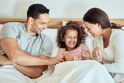 Buy stock photo Happy, family and bed with girl and parents together with laugh, game and playing in the morning. Funny, mom smile and bonding with love, care and support in a home with rest in bedroom with joke