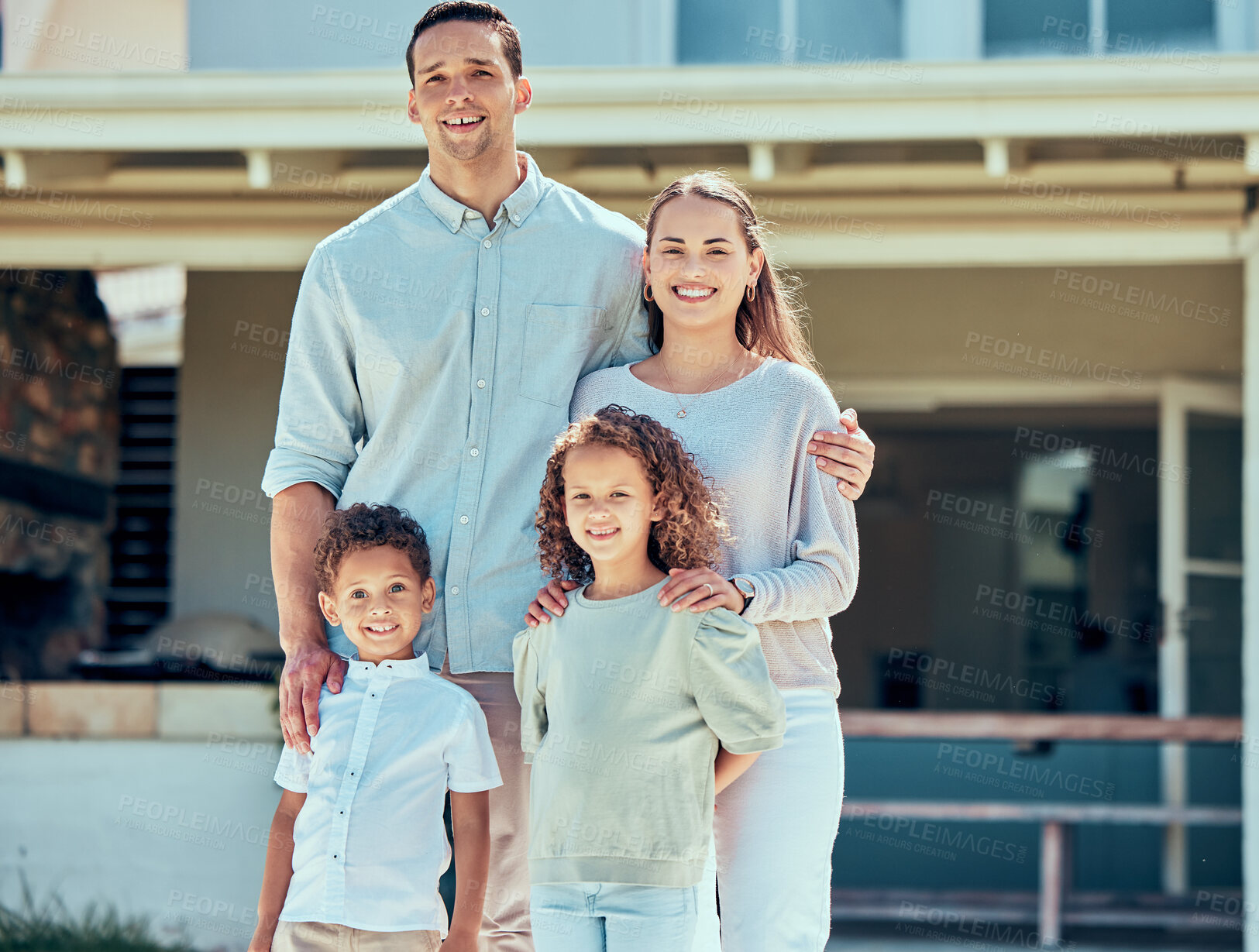 Buy stock photo Outdoor portrait, children and family smile for calm weekend, healthy relationship and support in home. Parents, happy kids and relax in backyard for bonding together, care and love with sunshine