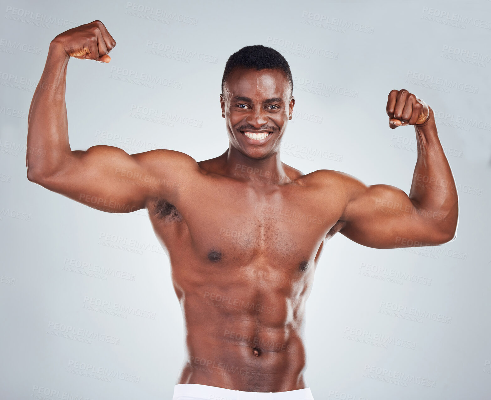 Buy stock photo Flexing, arms and black man with portrait in studio with fitness for muscle growth, strong body or power. Athlete, happy and topless with abs strength, underwear or wellness on gray background mockup