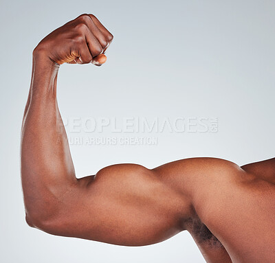 Buy stock photo Flexing, arm and closeup of person in studio with fitness for muscle growth, strong biceps and power. Bodybuilder, athlete and shwoing shoulder strength, healthy or wellness on gray background mockup