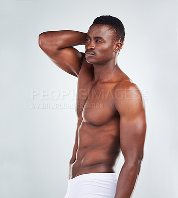 Buy stock photo Thinking, bodybuilder or black man with underwear in studio for fitness progress, confidence and health. Body, pride and male model with muscle development, growth and self care on white background